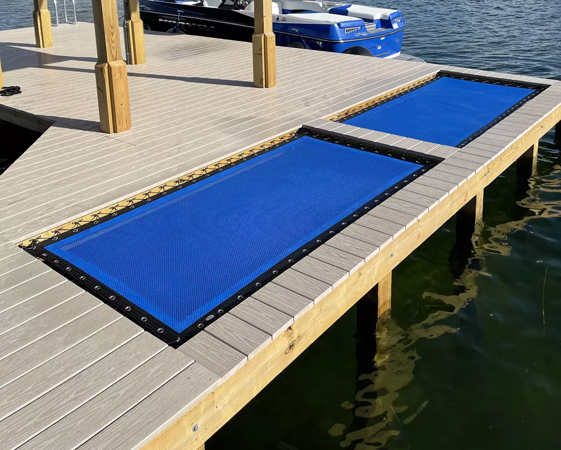 2 blue nets with black borders in a dock