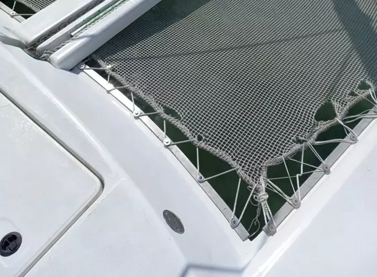 Catastrophic unzippering failure in catamaran trampoline net