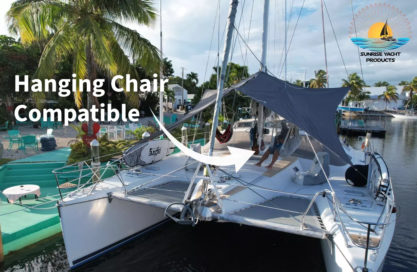 Catamaran bow shade providing sun protection over upgraded trampoline nets with Sailor's Pillows, creating
comfortable outdoor living space