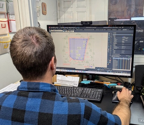 engineer working on a design drawing