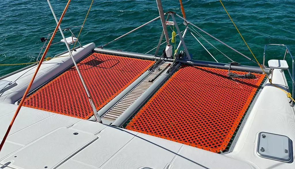 1 inch Webbing Nets, Coated Orange, Reinforced Borders with Grommets On Voyage Catamaran