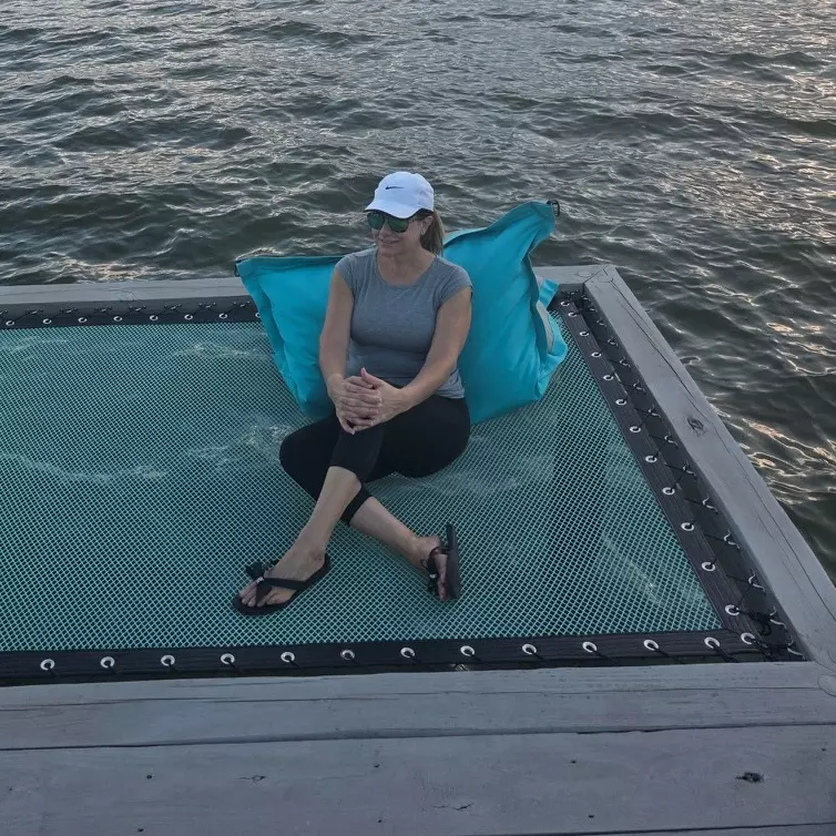 Lady enjoying a Sunrise Sailor's Pillow